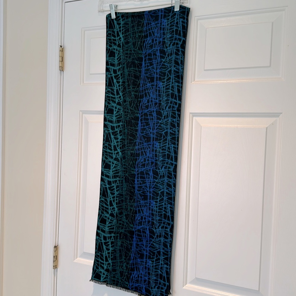 Lovely, soft scarf of varying blues and some greens.